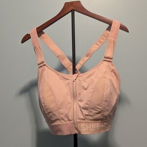 SHEFIT Front-Zip High-Impact Sports Bra in Light Pink